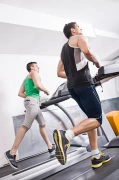 Two guys on treadmill Stock Photos