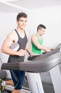 Two guys on treadmill Stock-Fotos