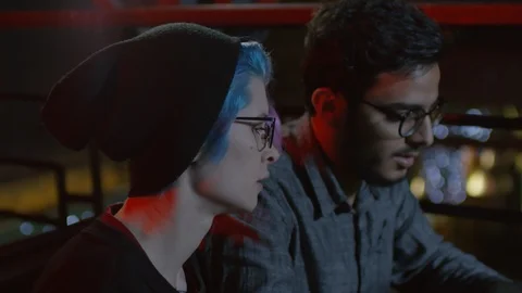Two Hackers Coding in Café Stock Footage 105290813