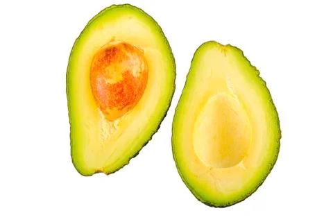 Two half of cut avocado on a white background 스톡 사진
