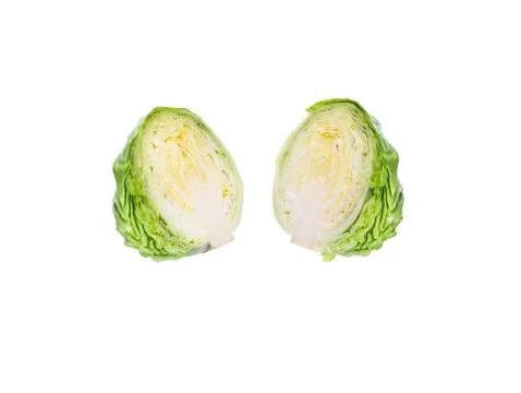 Two Half Green Head of young cabbage on a white isolate background. Vegetaria Stock Photos