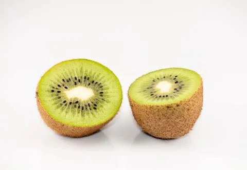 Two half kiwi fruit Foto stock