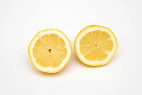 Two half lemon fruit isolated on white Stock Photos