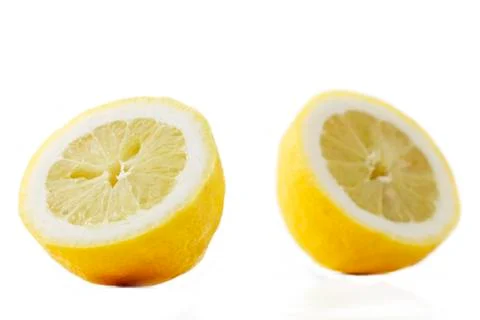 Two half lemons Stock Photos