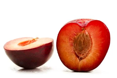 Two half plums Stock Photos
