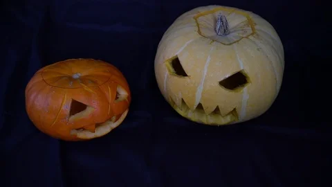 Two Halloween Pumpkins Isolated on a Dark Background 库存影片 96706370