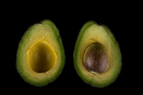 Two halves of an avocado Stock-Fotos