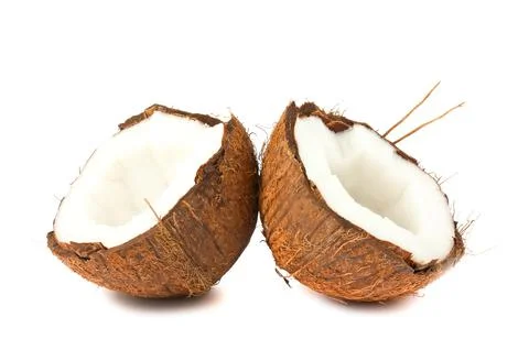 Two halves of coconut on white background Stock Photos