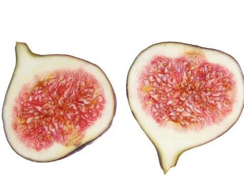 Two halves of a fig. Figs isolated on white Stock Photos