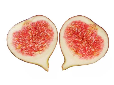Two halves of a fig. Figs isolated on white Foto stock