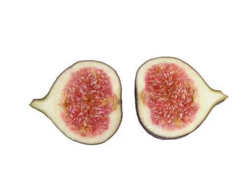 Two halves of a fig. Figs isolated on white Stock Photos