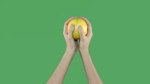 Two halves of a grapefriut on green screen Stock Footage 71628813