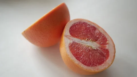 Two halves of a grapefruit Stock Footage 151394928
