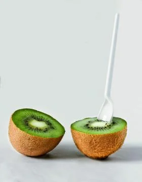 Two halves of kiwi Stock Photos