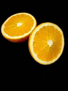 Two halves of an orange Stock Photos