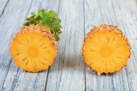Two halves of pineapple, cuted ripe pineapple Stock Photos