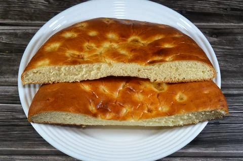Two Halves of Plain Turkish soft bread made of Yoghurt Yogurt, flour, yeast.. Stock Photos