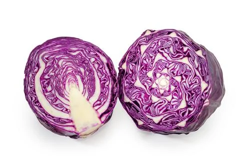 Two halves of red cabbage cut along and cut across Stock Photos