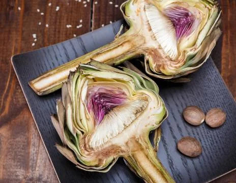 Two halves of ripe artichoke Stock Photos