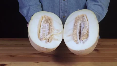 Two halves of ripe melon with seeds Stock-Footage 314787583