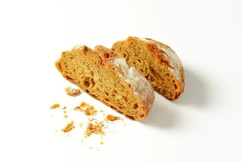 Two halves of whole grain bread with jam Stock Photos