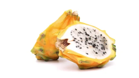 Two halves of yellow dragon fruit is rotating on white background. Stock Footage 158917784