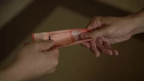 Two hand fighting over money Stock Footage 292758577