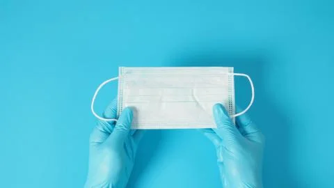 Two Hand with gloves and face Mask for protection from virus infection and ch Stock Photos