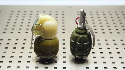 Two hand grenades close up Stock Footage 222187529
