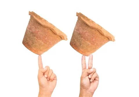 Two hand holding pot Stock Photos