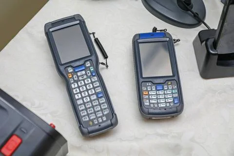 Two Handheld Computers Two Handheld Barcode Reader Scanner Computer Device... Stock-Fotos
