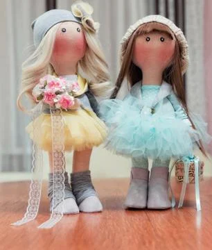 Two handmade rag dolls - blonde and brown-haired Stock-Fotos