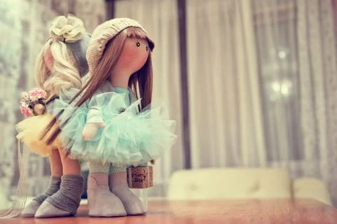 Two handmade rag dolls - blonde and brown-haired Stock Photos