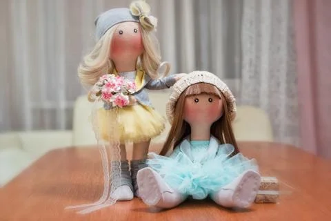 Two handmade rag dolls - blonde and brown-haired Stock Photos