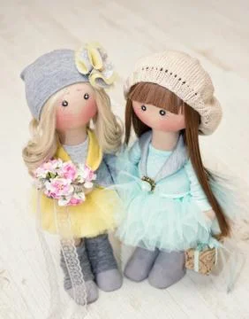 Two handmade rag dolls - blonde and brown-haired. view from the top 스톡 사진