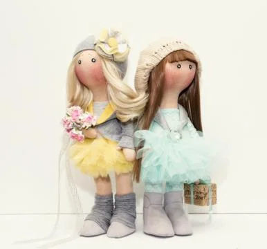 Two handmade rag dolls - blonde and brown-haired Stock Photos