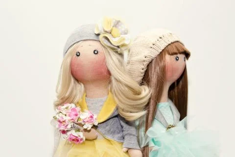 Two handmade rag dolls - blonde and brown-haired Stock Photos