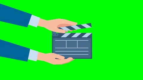 Two hands appear from the left, holding film clapperboard. Film crew: assistant Vidéo 330707505