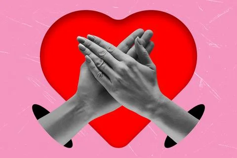 Two hands are brought together to create the outline of a heart on a bright p Foto stock