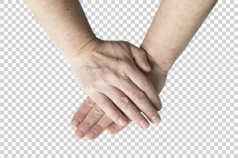 Two hands are interlocked with fingers crossed 写真素材