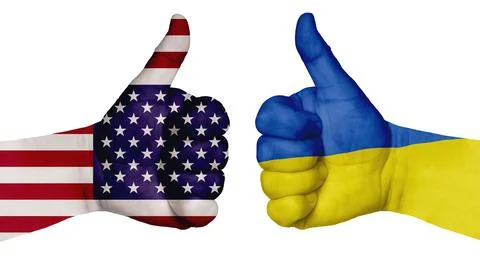 Two hands are painted with flags of different countries, with a thumb raised  Foto stock