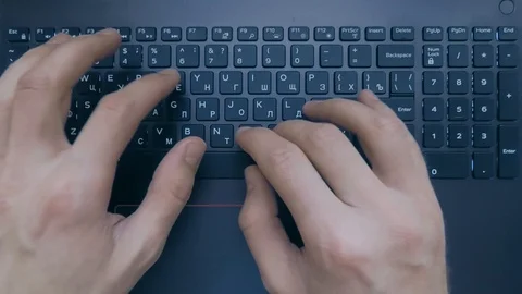 Two hands are typing on the keyboard of ... | Stock Video | Pond5