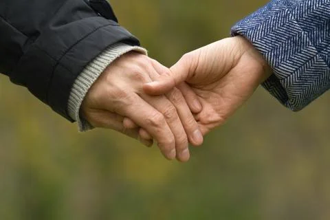 Two hands came together Stock Photos