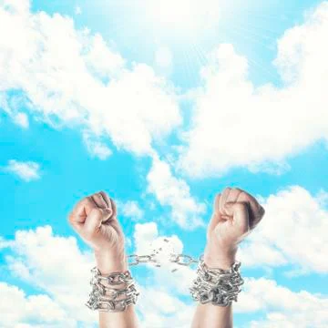 Two hands in chains Stock Photos