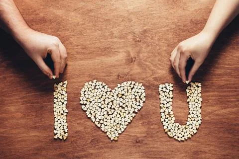 Two hands composing "i love you" writing. Stock Photos