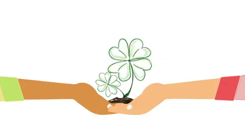 Two hands of different races join together and a plant is born between their Stock Footage 135900081