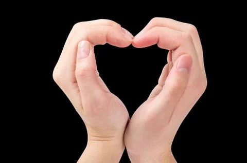 Two hands form a heart shape Stock Photos