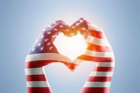 Two hands in the form of heart with Usa flag Stock Photos