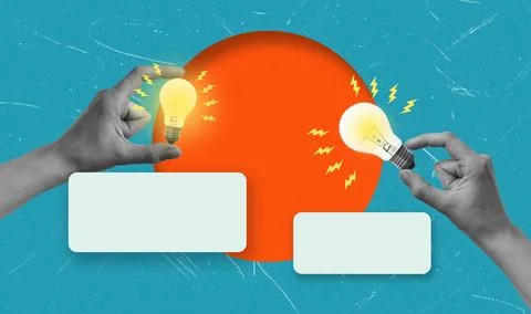 Two hands hold light bulbs on either side of a bright orange circle against a Stock Photos