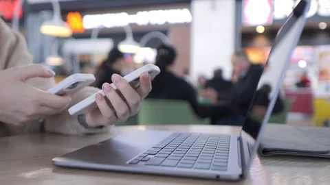 Two hands hold smartphones Stock Footage 340963759